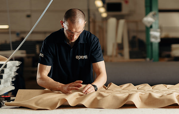 Opera Beds manufacturer making a bed using upholstery materials and textiles